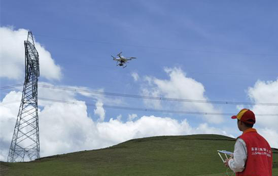湖南國網(wǎng)采用無人機(jī)進(jìn)行專項(xiàng)巡檢迎峰度夏(圖1) 湖南國網(wǎng)采用無人機(jī)進(jìn)行專項(xiàng)巡檢迎峰度夏(圖1)